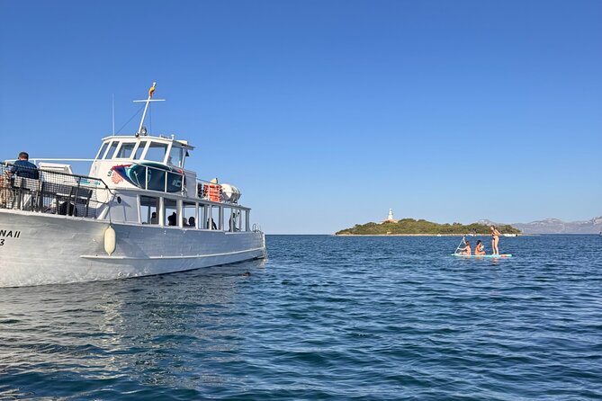 Morning Boat Trip in Alcudia with Swim Stop & Tapas - Setting Out Across Alcúdia Bay