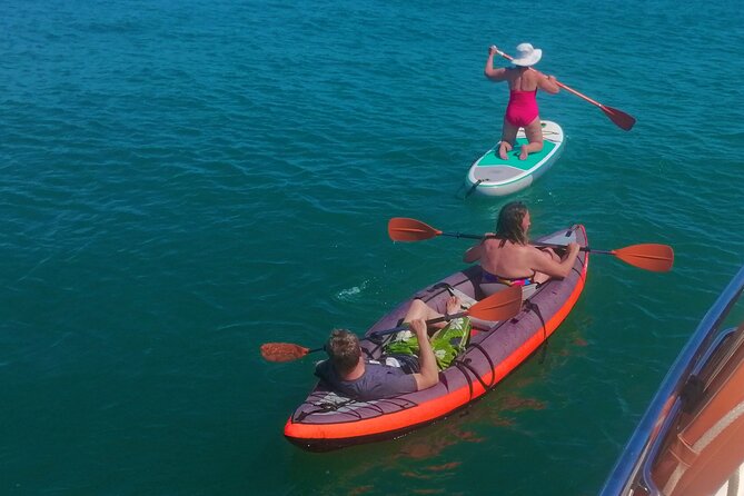 Morning private charter with drinks tapas, paddle boards &kayak - Who should book this Lagos charter?