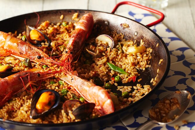 Paella Class & Bottomless Wine: Las Ramblas Views - The chefs bring different personalities
