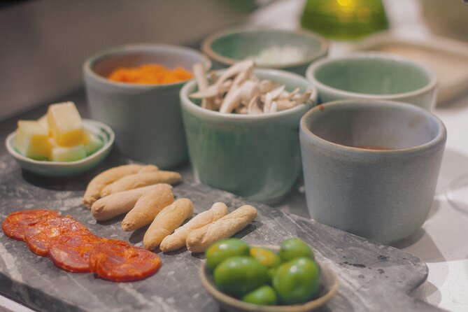Paella Cooking Class in Madrid with Bottomless Wine Pairing - What the two-and-a-half-hour experience feels like