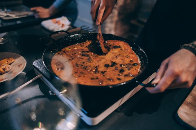 Paella Cooking Class with Professional Chef: Four Course Dinner - Starting with cava in El Raval
