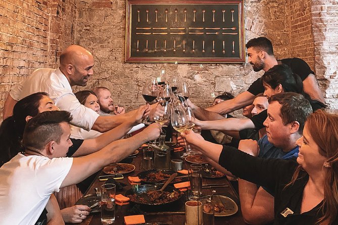 Paella Cooking Class with Professional Chef: Four Course Dinner - Sitting down to the four-course dinner