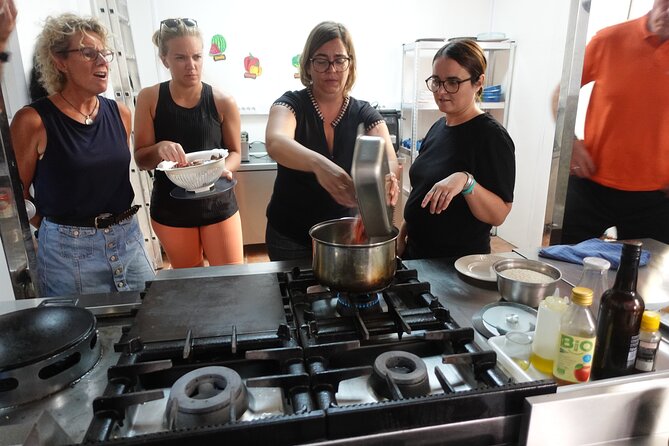 Paella & Sangria Class with Tapas and Market Visit - Making tapas and mixing the sangria