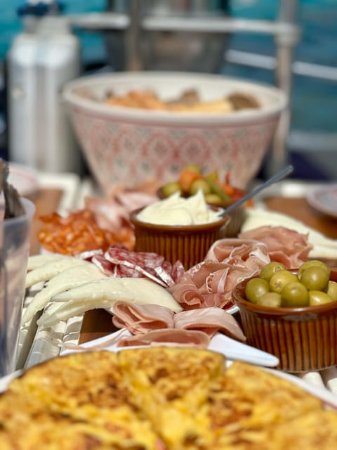 Palma de Mallorca: Sailing Boat Trip with Skipper & Tapas - Sailing across the Bay of Palma
