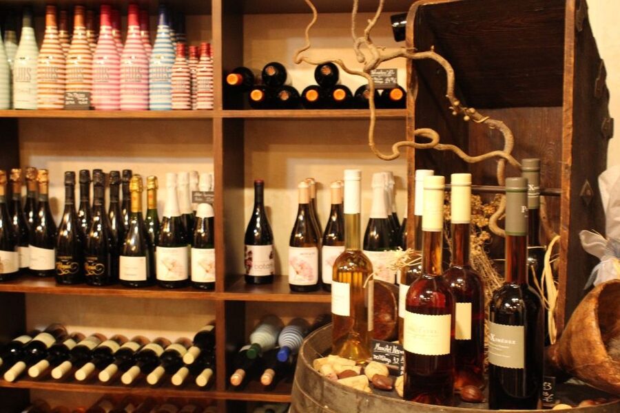 Palma Tour with Wine and Tapas Tasting - Olive oil, ham, cheese, and the Spanish table