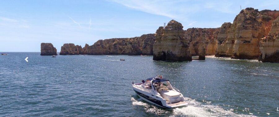ponta da piedade 2h luxury charter with drinks and tapas - Praia da Dona Ana from the water