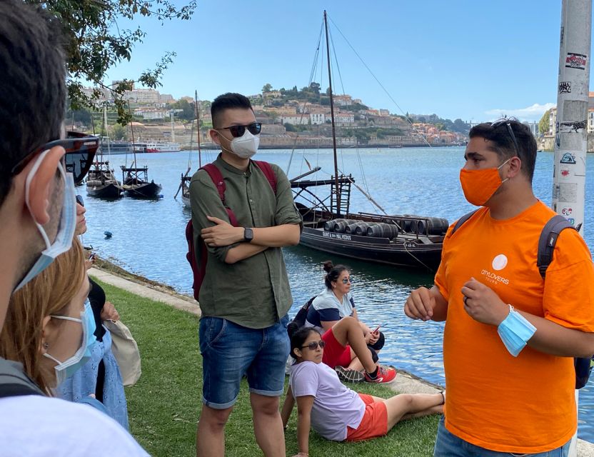Porto: Wine Tasting with Tapas Walking Tour - Walking through old Porto and Ribeira
