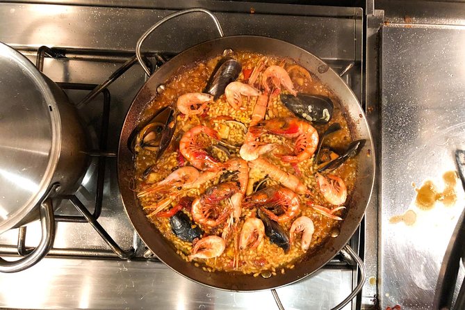 Private Authentic Paella Cooking Class in Barcelona with Josh - Starting with sangria and fruit preparation