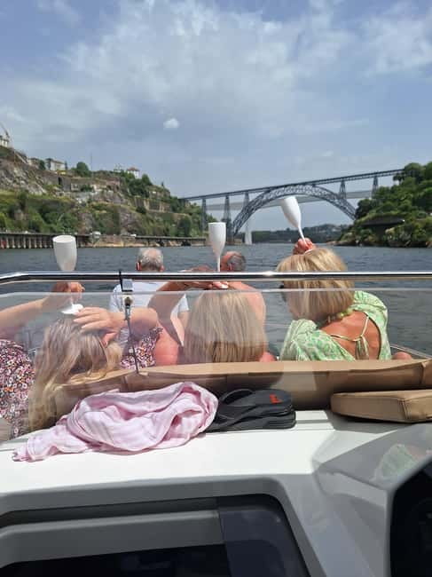 Private Boat Tour in Porto with Portuguese Tapas Option - Returning past Afurada and Gaia