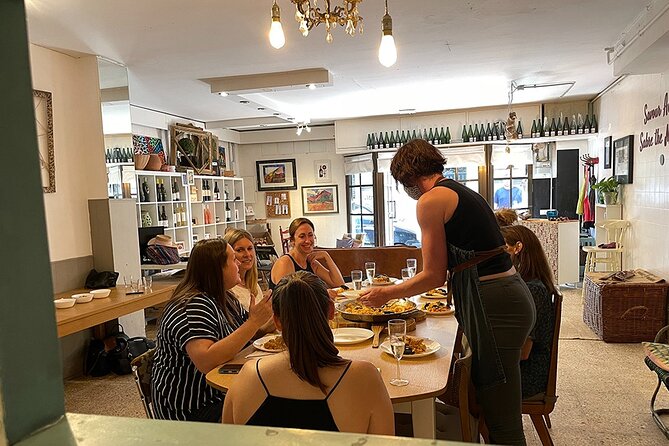 Private Cava Sabrage and Paella Class in Barcelona - The cava sabrage session with Zara