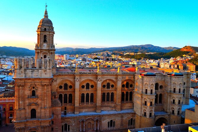 Private Malaga City Center Walking Tour with Tapas Food Tastings - Calle Granada and Iglesia de Santiago