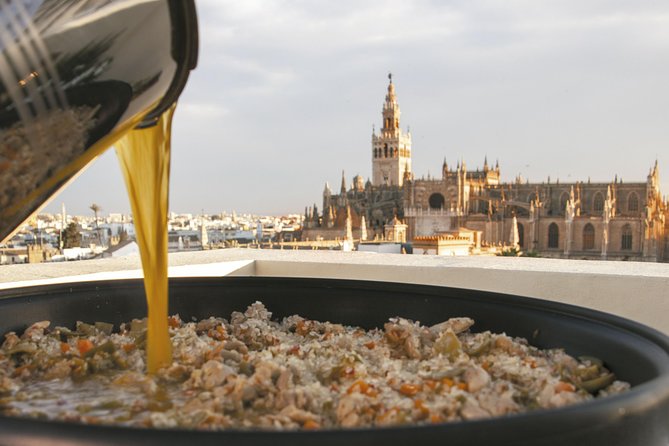 Private: Paella Cooking Class & 30-minute expert Q&A - Eating the paella above Seville