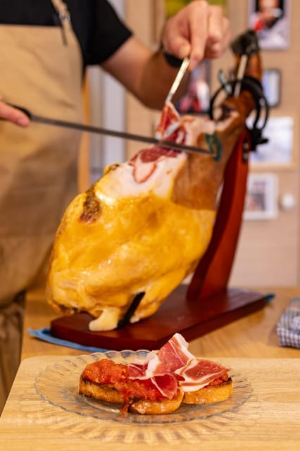 Private Paella & Tapas Cooking Class in a Local Chef's Home - A relaxed welcome with drinks and small bites