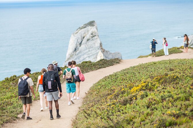Private Sunset Hike, Tapas & Wine at Secret Beach - Riding west in a convertible Jeep