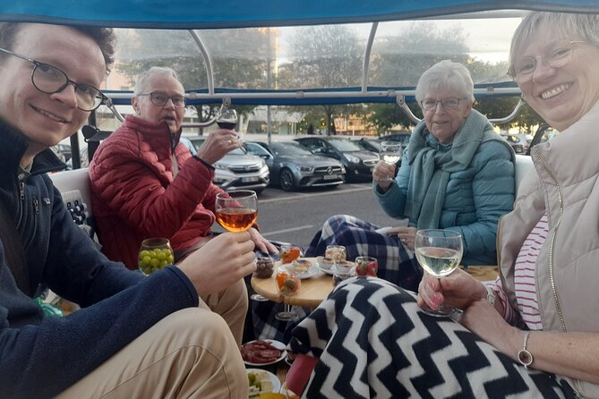 Private tapas tuk tuk tour through Lisbon - São Vicente, Alfama, and a monument with a complicated description