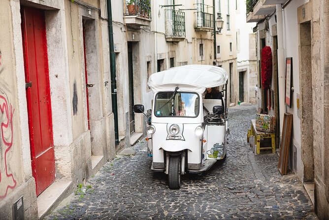 Private Tuktuk Tour with Portuguese Tapas and Wine - Baixa, Rossio, and Restauradores in ten minutes