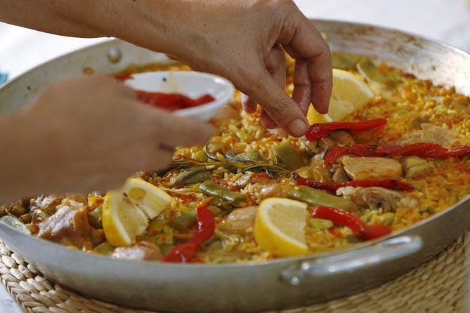 Rooftop Paella Seafood Cooking Class Experience in Barcelona - Timing, language, and practical details