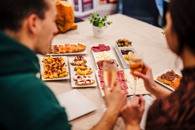 Sagrada Familia Jamon & Tapas Tasting Experience - Tapas that make this more than a cheese plate