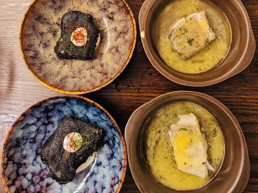 San Sebastian: Market, Pintxos and Wine Tasting Tour - Four old-town stops and a lot of food