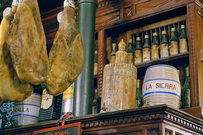 Sevilla Food Tour: Tapas, Wine, History & Traditions - Walking Seville’s old center between bites