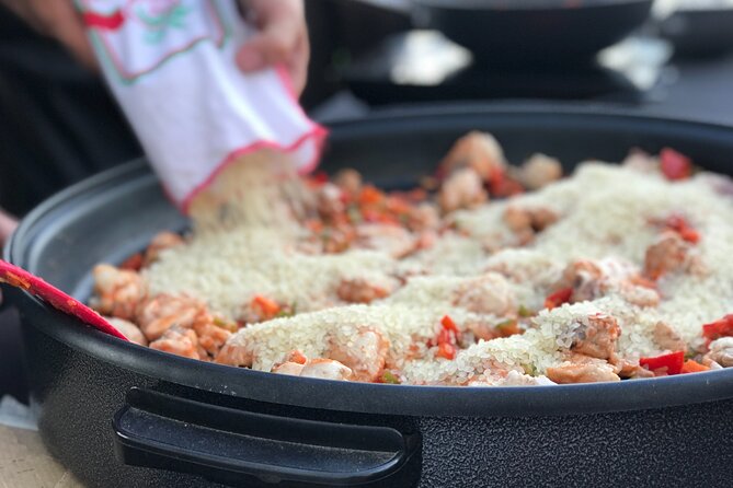 Sevilla: Rooftop Paella Cooking Class & 30-minute expert Q&A - Key points at a glance