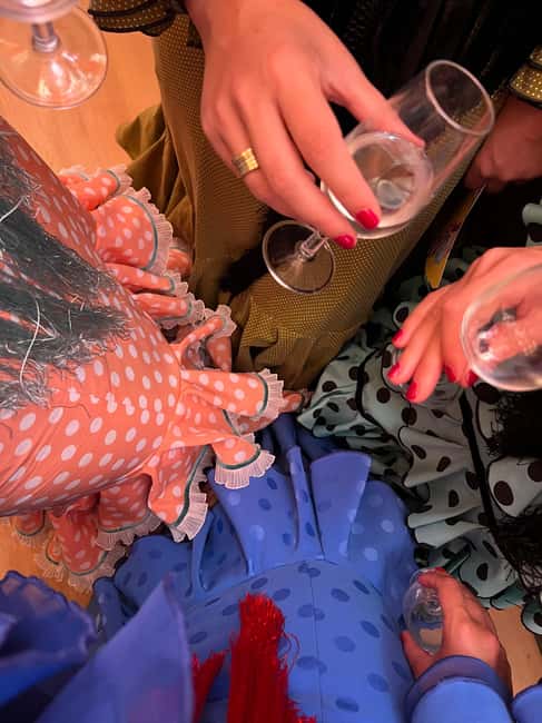 Seville: April Fair Guided Walking Tour with Tapas & Drinks - Languages, guide style, and group size