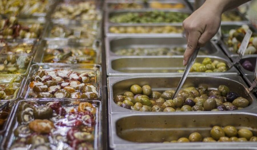 Seville: Food Tour with 10 Tastings of Tapas, Ham, Churros - Pringá, pinchito, and sharper seafood flavors