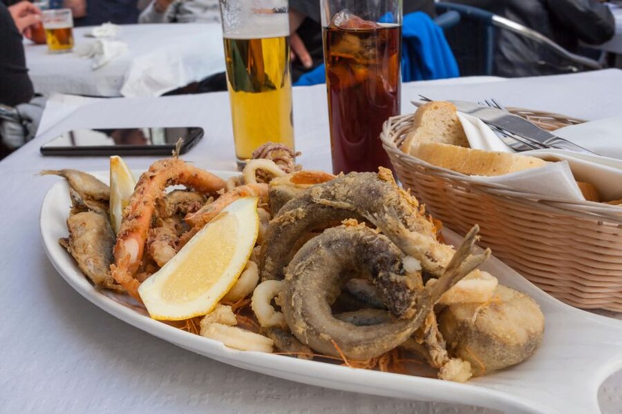 Seville Food Tour with Tapas & Drinks with a Local - Pringà and the heavier side of Seville