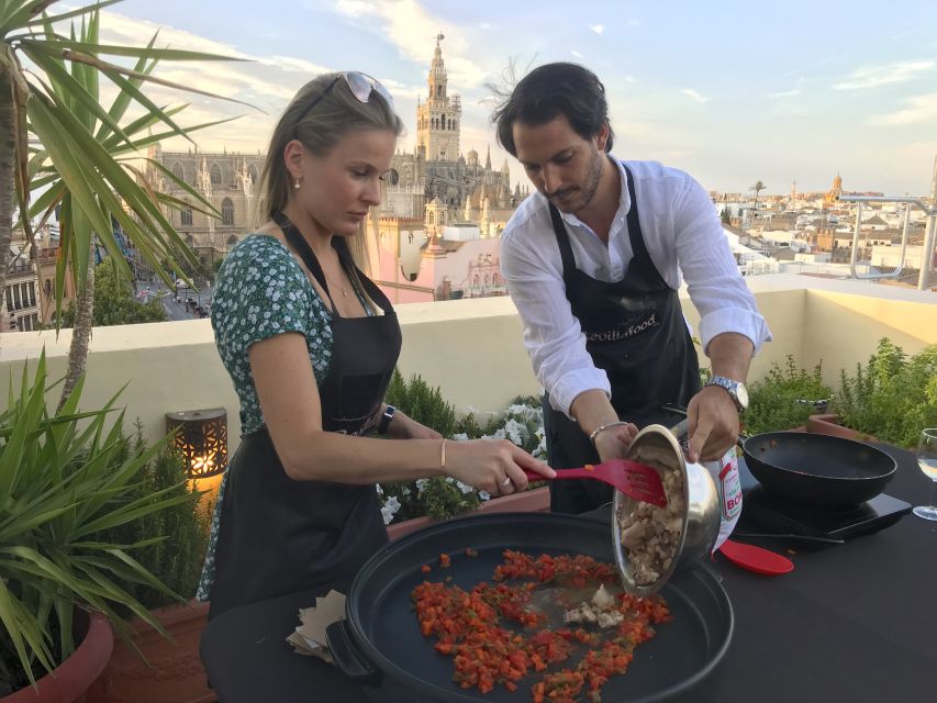 Seville: Paella Cooking Class & 30-Min Local Expert Q&A - Mixing sangria before the meal