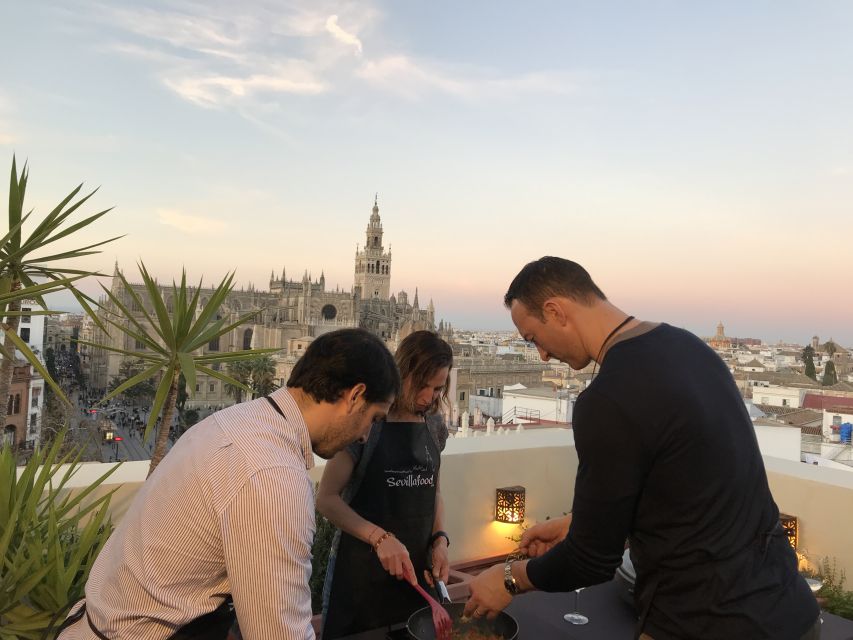 Seville: Paella Cooking Class & 30-Min Local Expert Q&A - Sitting down to eat what you made