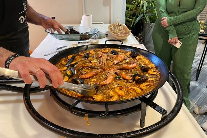 Seville: Paella Showcooking Experience - What this Seville paella experience really is