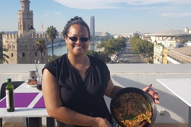 Seville: Paella Showcooking Experience - Eating the paella and sangria