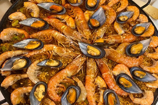 Seville: Paella Showcooking Experience - The paella presentation, from rice to serving pan