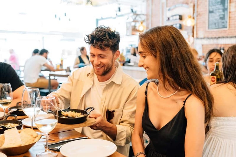 Seville: Private Tapas and Wine Tour with Rooftop Drink - The first bodega and the Andalusian aperitif