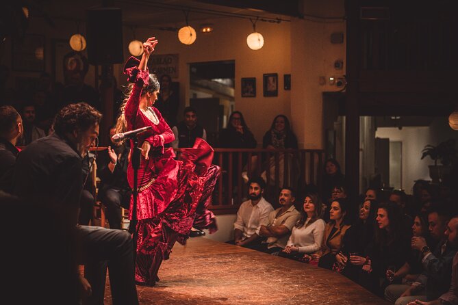 Seville Private Tapas & Wine Experience with Flamenco Show - Walking the old center beside the Giralda