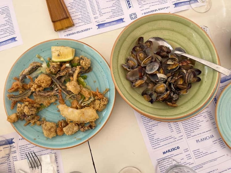 Seville: Secret Food Tour with Tapas and Drinks - Moving through Triana for the main tasting