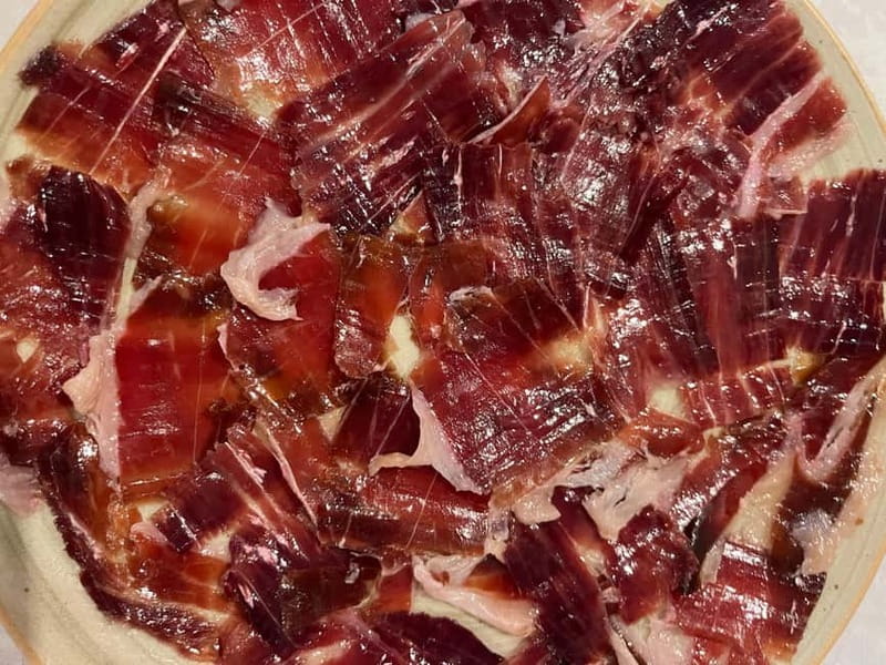 Seville: Secret Food Tour with Tapas and Drinks - Traditional dishes, creative tapas, and drinks