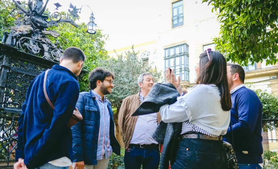Seville: Small Group Jewish Quarter Tour with Tapas & Drinks - Santa Cruz Square and Murillo Gardens