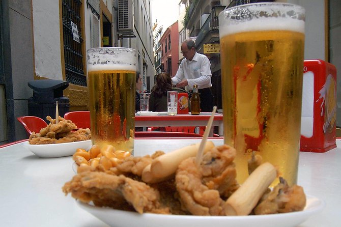 Sevillian tapas tasting on a bicycle (3 bars-3 tapas-3 drinks) - Key points at a glance