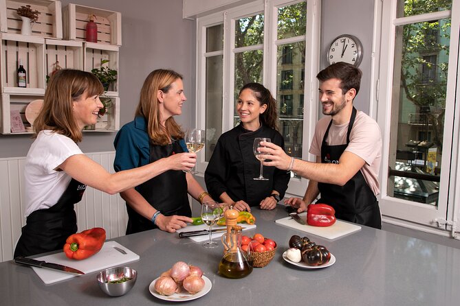 Spanish Tapas Workshop: Boqueria Tour & Rambla Views - Cooking four courses with a small group