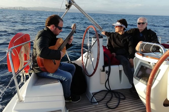 Sunset Sailing Experience w/ Live Spanish Guitar & Spanish Tapas - Tapas, cava, beer, and the value of the price