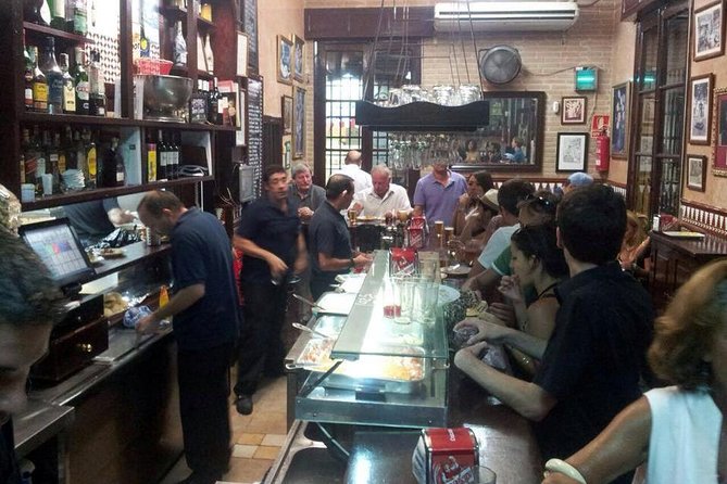 Tapas and Wine Tasting Tour in Seville Small Groups and Jewish Quarter - Tapas first, sightseeing woven in