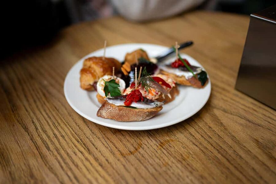 Tapas Food Tour with Dinner in Barcelona - The guides and the social mood