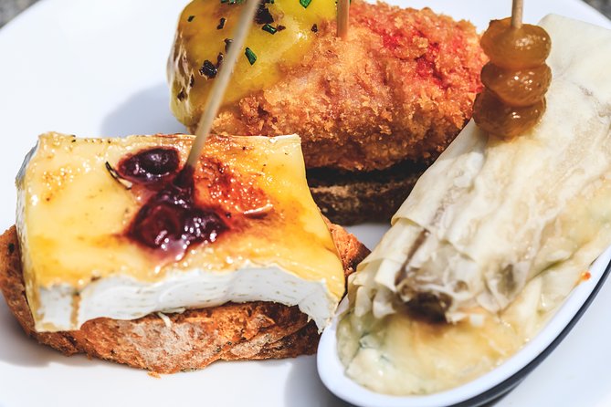 The Authentic Bilbao Pintxos, Food & Wine Tour with a Local - Walking through Bilbao between bites