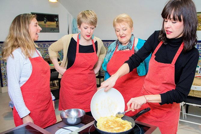 Traditional Paella & Tortilla & Sangria - Making sangria and sharing the table