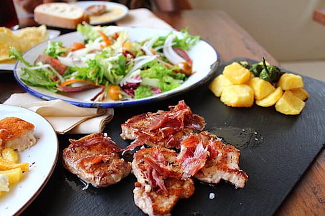 True Taste of Granada Old Town & Albaicin Tapas Tour - Puerta de Elvira and the first taste of the Albaicín