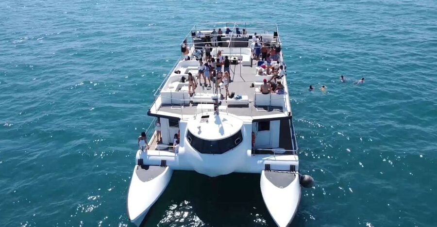Valencia: Catamaran Cruise, Paella Lunch and Swim Stop - Lunch first: salad, paella, and fruit