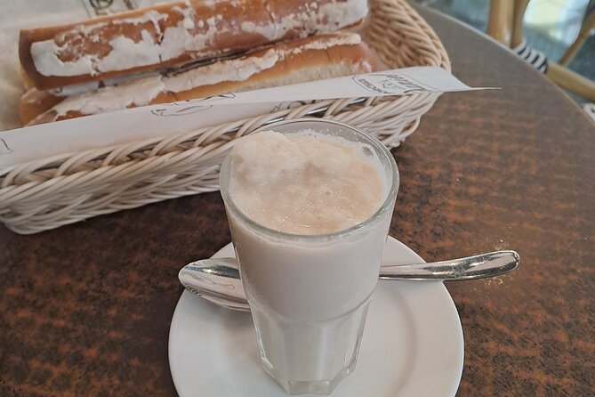 Valencia Food Tour: Tapas, Drinks and Delights with a Local - Plaça del Tossal and the first tapas bar