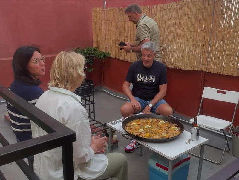 Valencia: Paella Cooking Class with Tapas and Drinks - Eating the paella and making a full evening of it