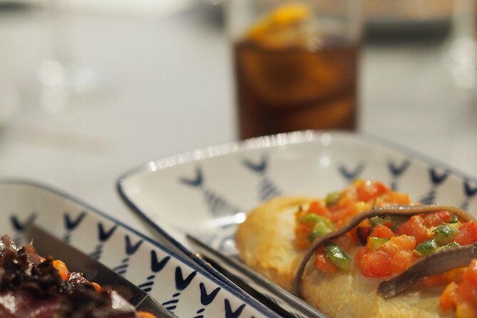 Valencia Tapas Crawl by Food Lover Tour - Start with tortilla, ham, and Valencian cheese